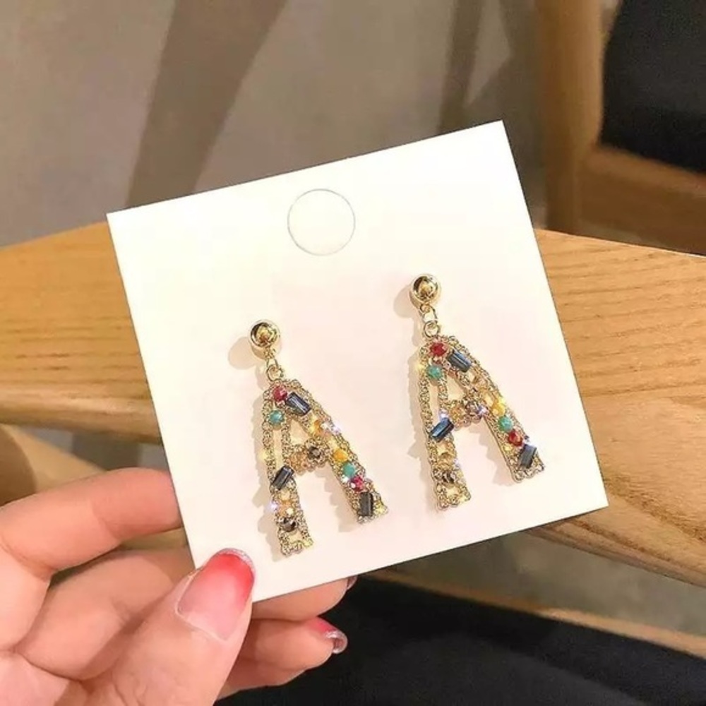 “A” drop earrings